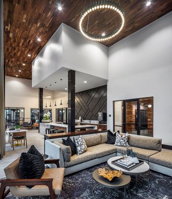 Aura thirty2 new apartments in austin, texas clubhouse with kitchen
